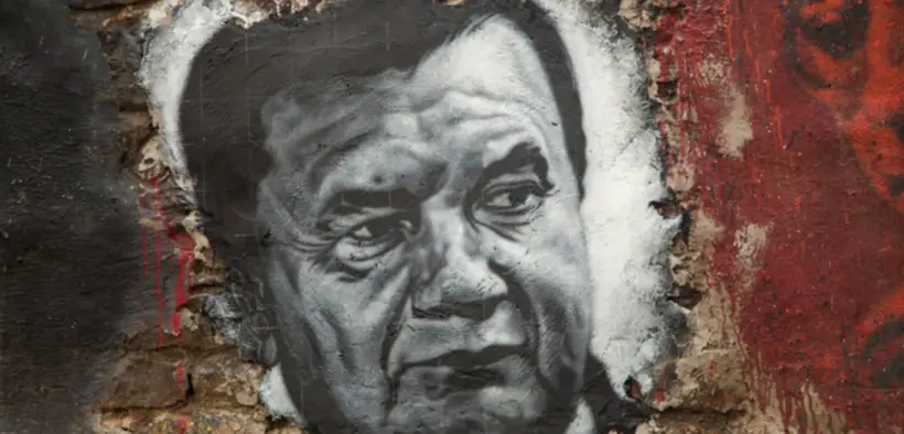 Viktor Yanukovych (painted portrait on a wall.)