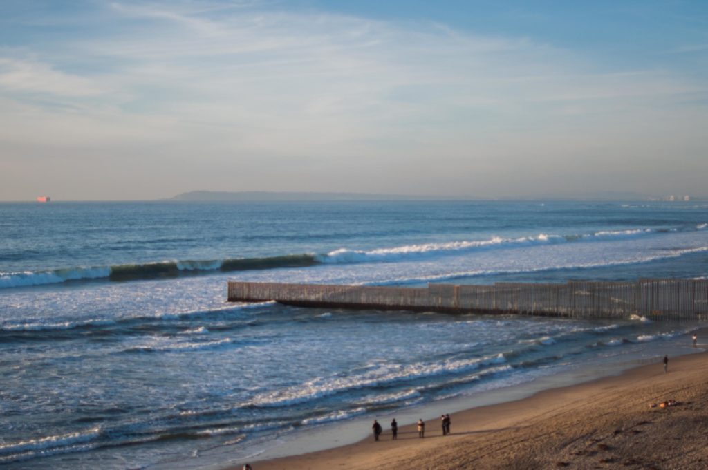 The U.S.-Mexico border wall in Playas, Tijuana, where it extends out into the Pacific Ocean.