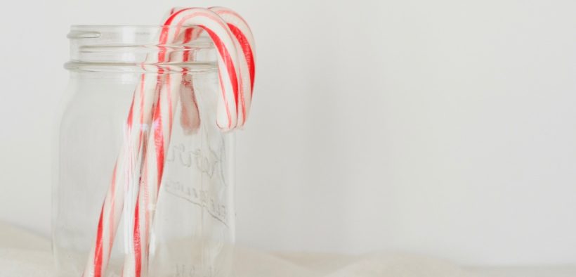 Candy canes in a jar.